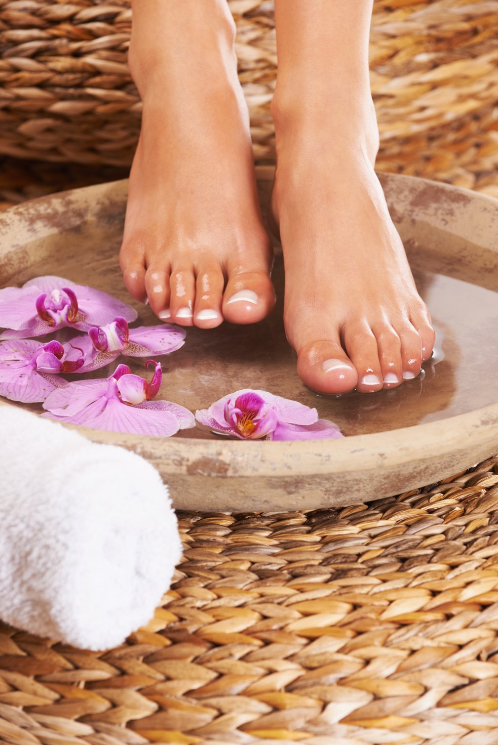 Relaxing Spa Treatment. Closeup of Feet Getting a Spa Treatment.